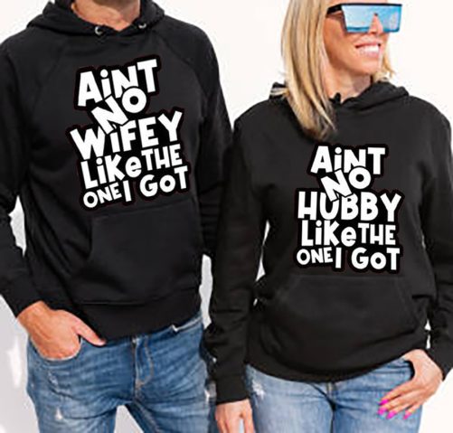 Woman and man wearing black hoodies, mockup for hoody sweatshirt design