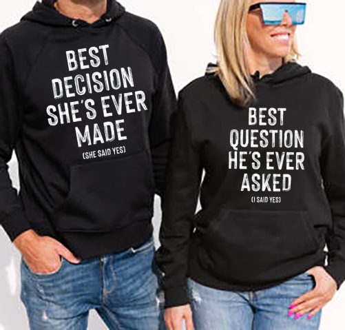 Woman and man wearing black hoodies, mockup for hoody sweatshirt design